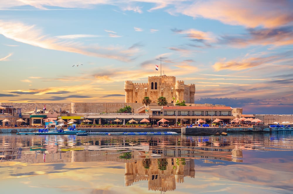 View of the Citadel of Qaitbay and beautiful Mediterranean sea coast in Alexandria, Egypt.